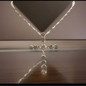 SS925 Infinity Cross Lined W/Crystals Pendant Placed On A SS925 Necklace